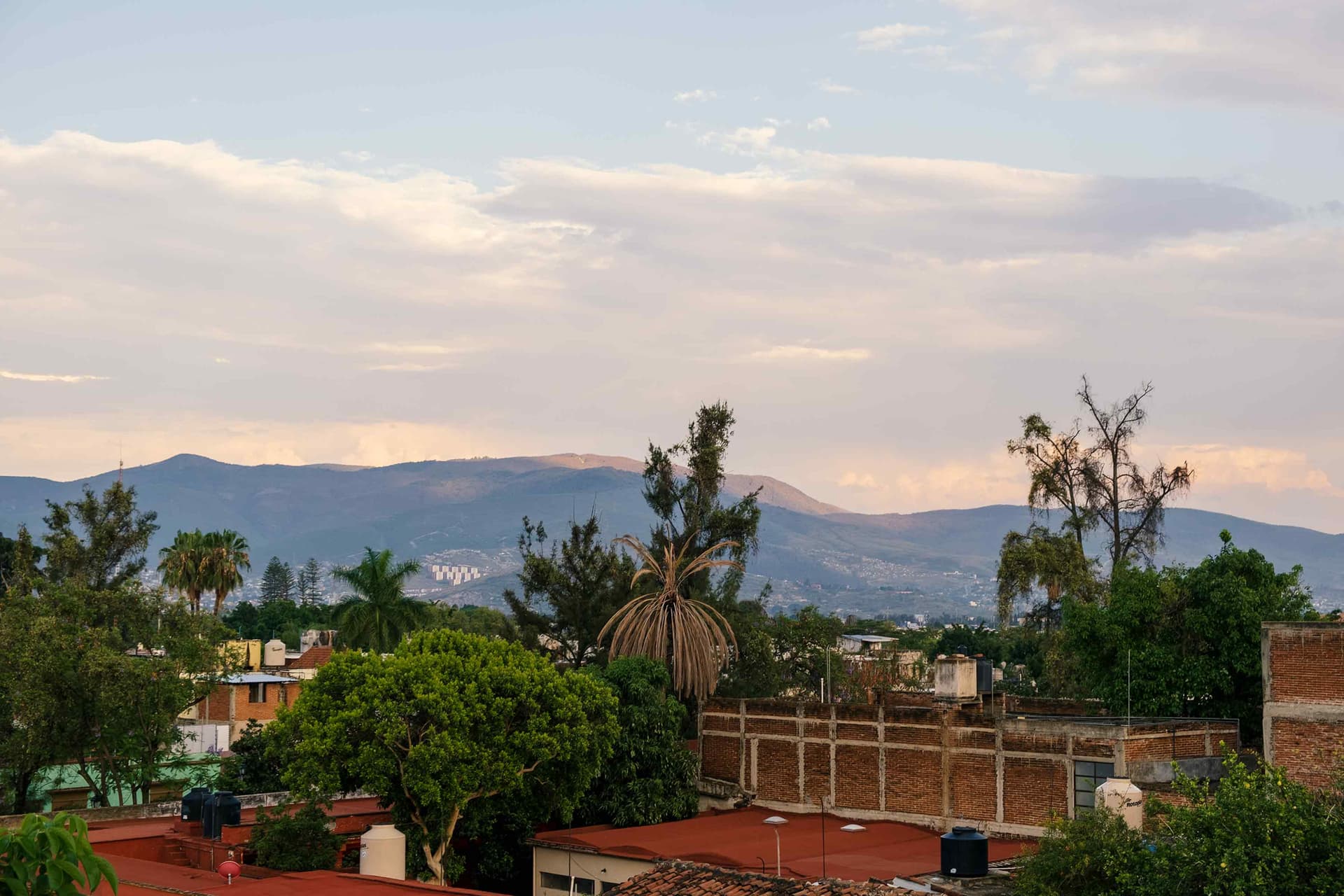 City skyline with mountains in background