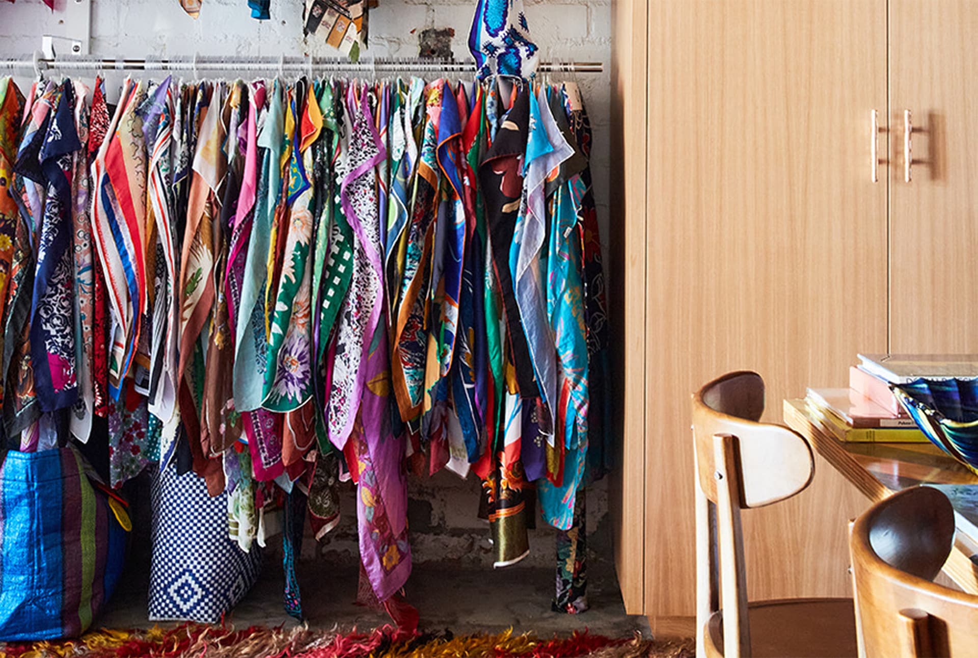 Numerous textiles hang indoors